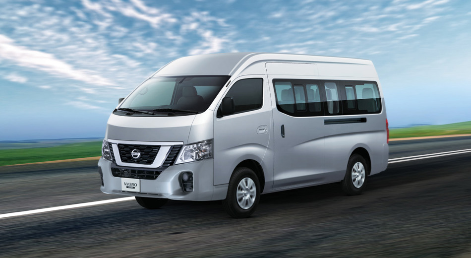Silver Urvan driving on open road